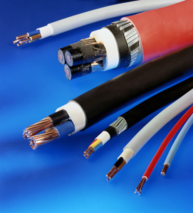 Jacketed wire and cable is cross-linked in a high energy electron beam irradiation process by E-BEAM Services, Inc. to enhance structural performance characteristics that provide improved temperature, chemical, stress, and abrasion resistance for both small and wide diameter wire and cable. 